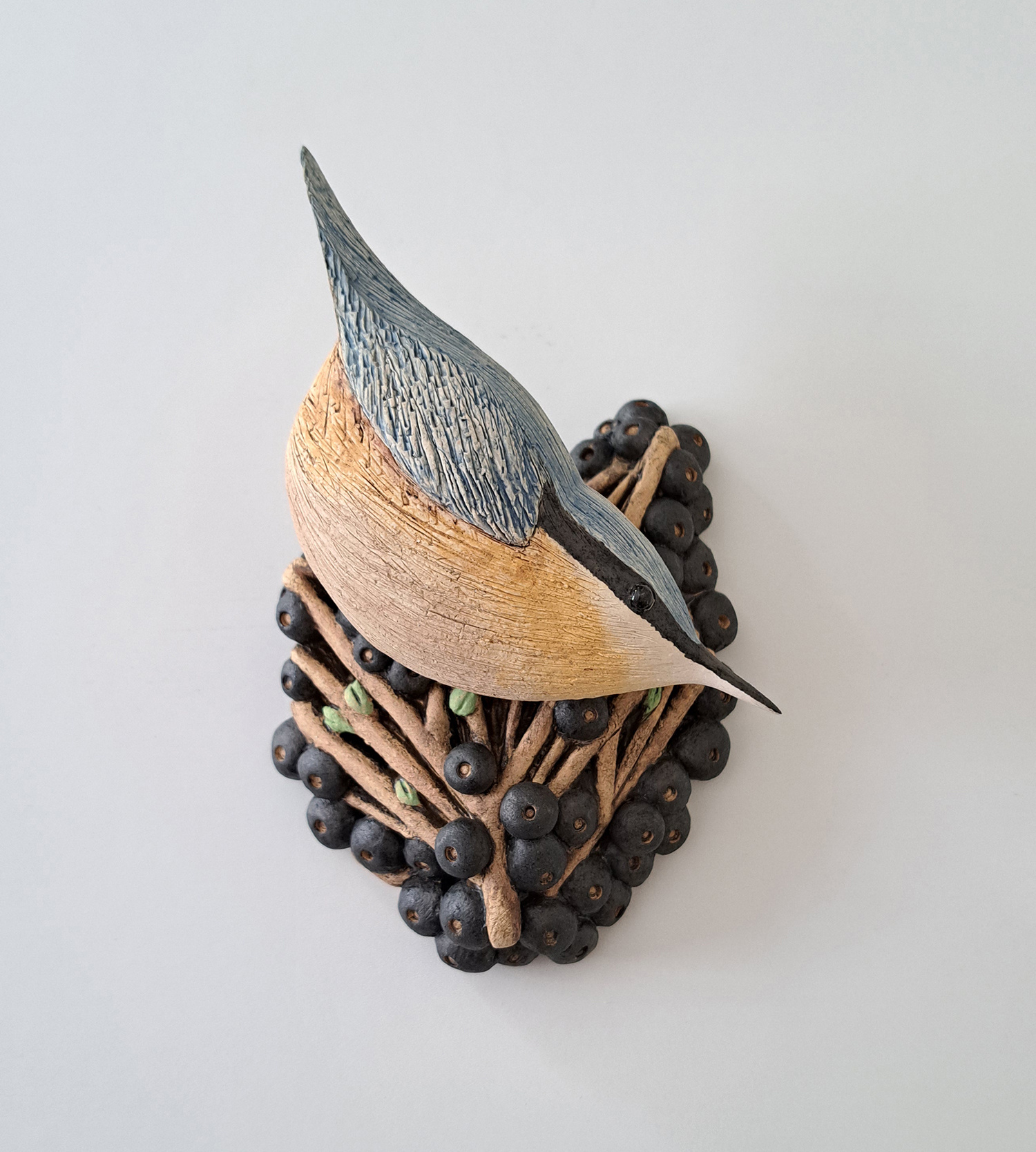 Nuthatch with Black Berries by Annie Tortora