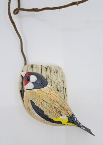 Goldfinch on Bark with Wirly Twig by Annie Tortora - alternative image