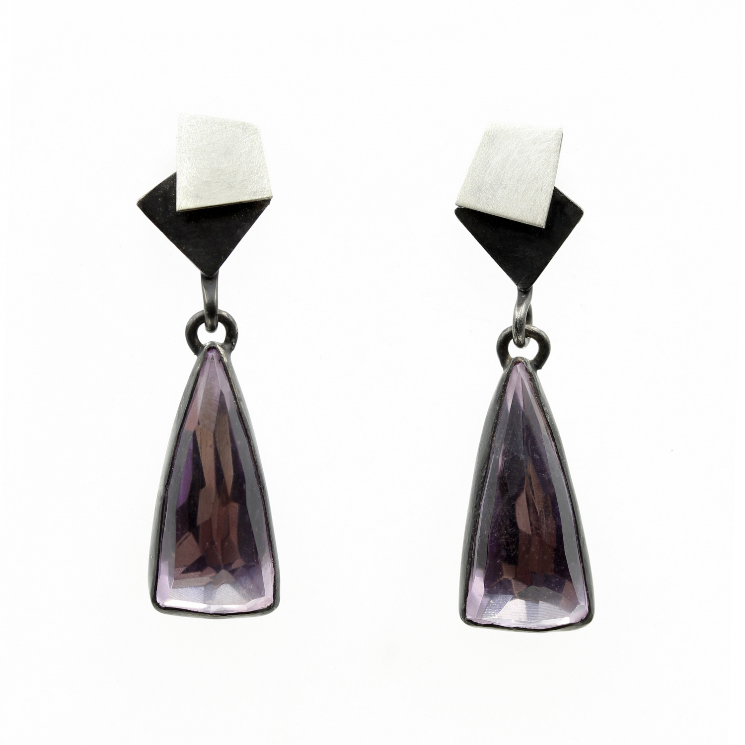 Earrings by Daphne Krinos