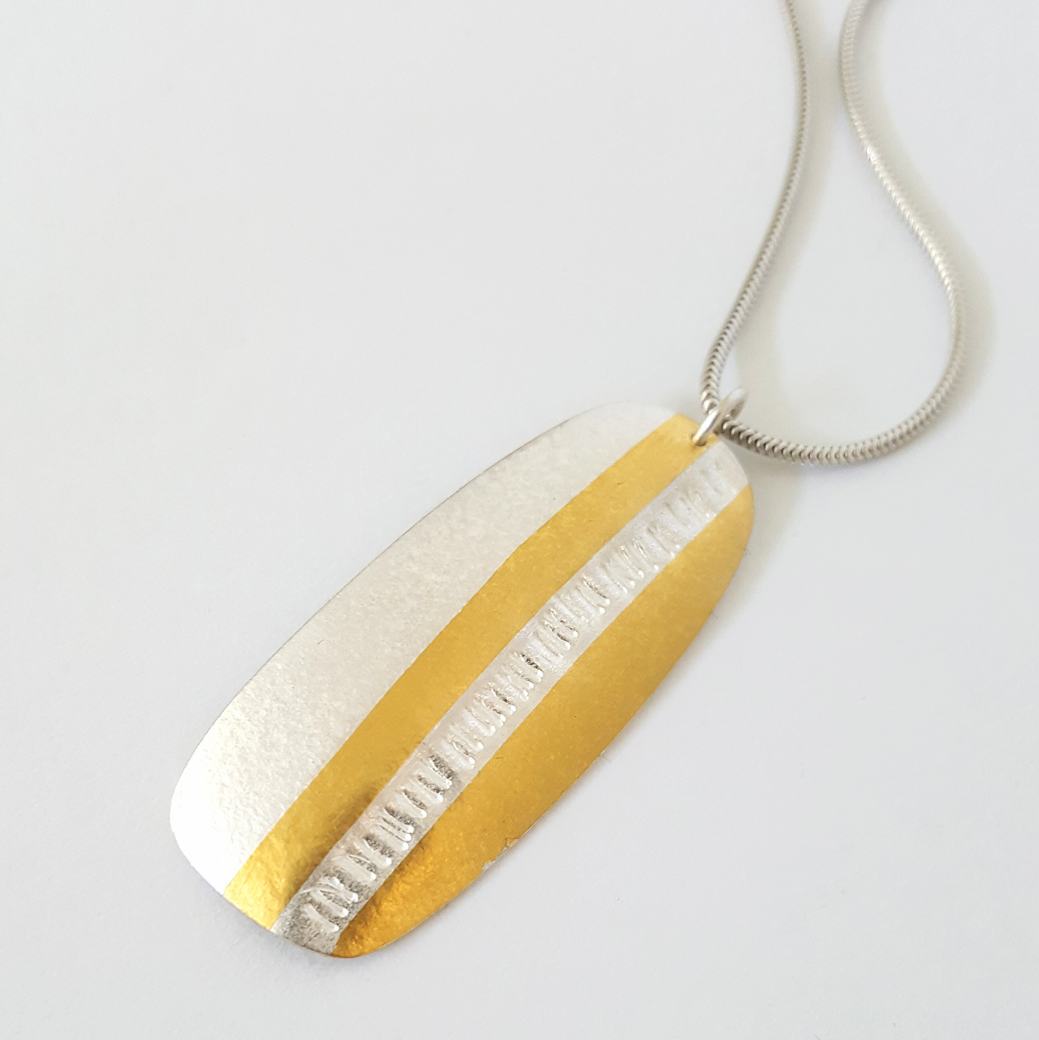 Lined Pebble Pendant by Jessica Briggs