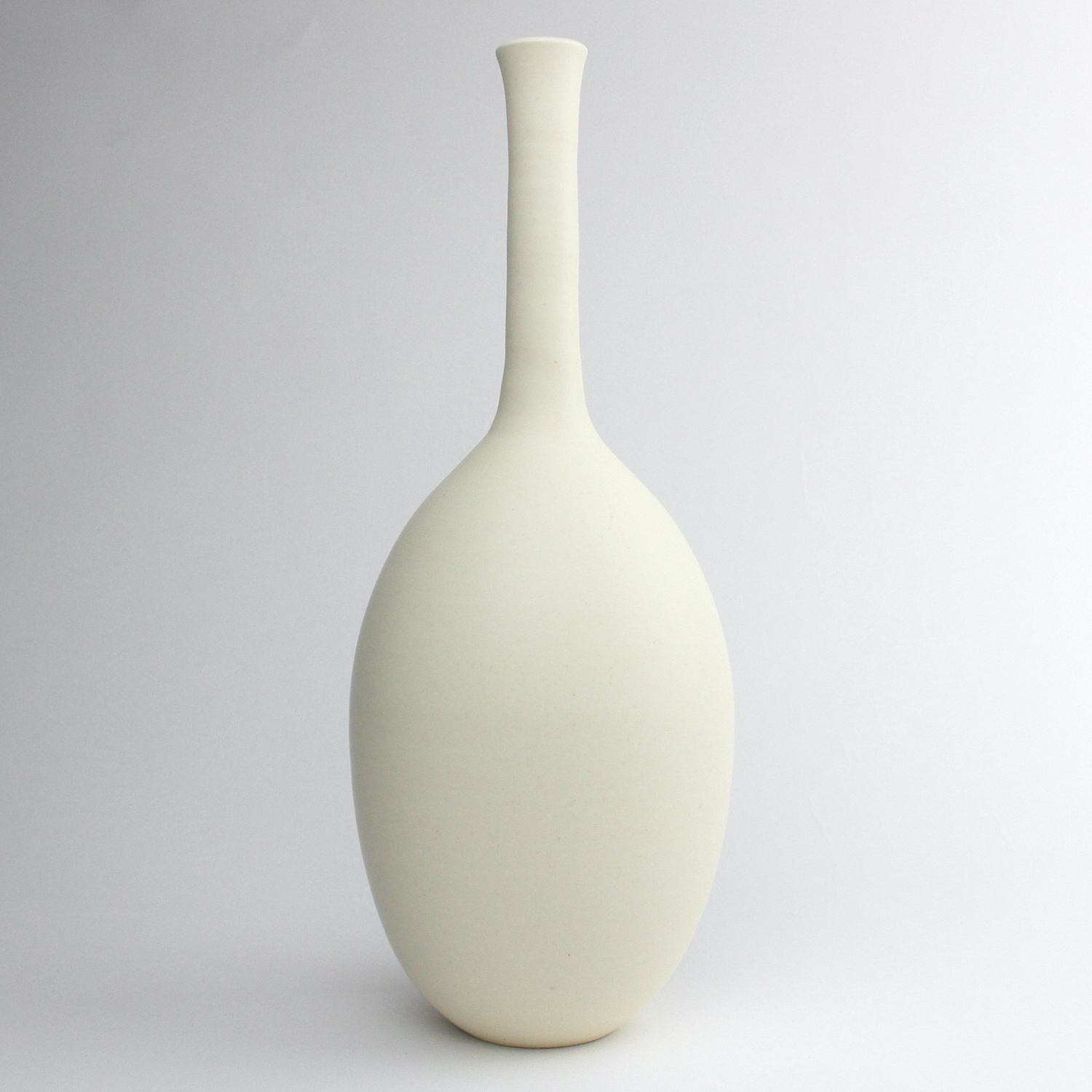 Long-necked Oval Vase, ivory by Lucy Burley