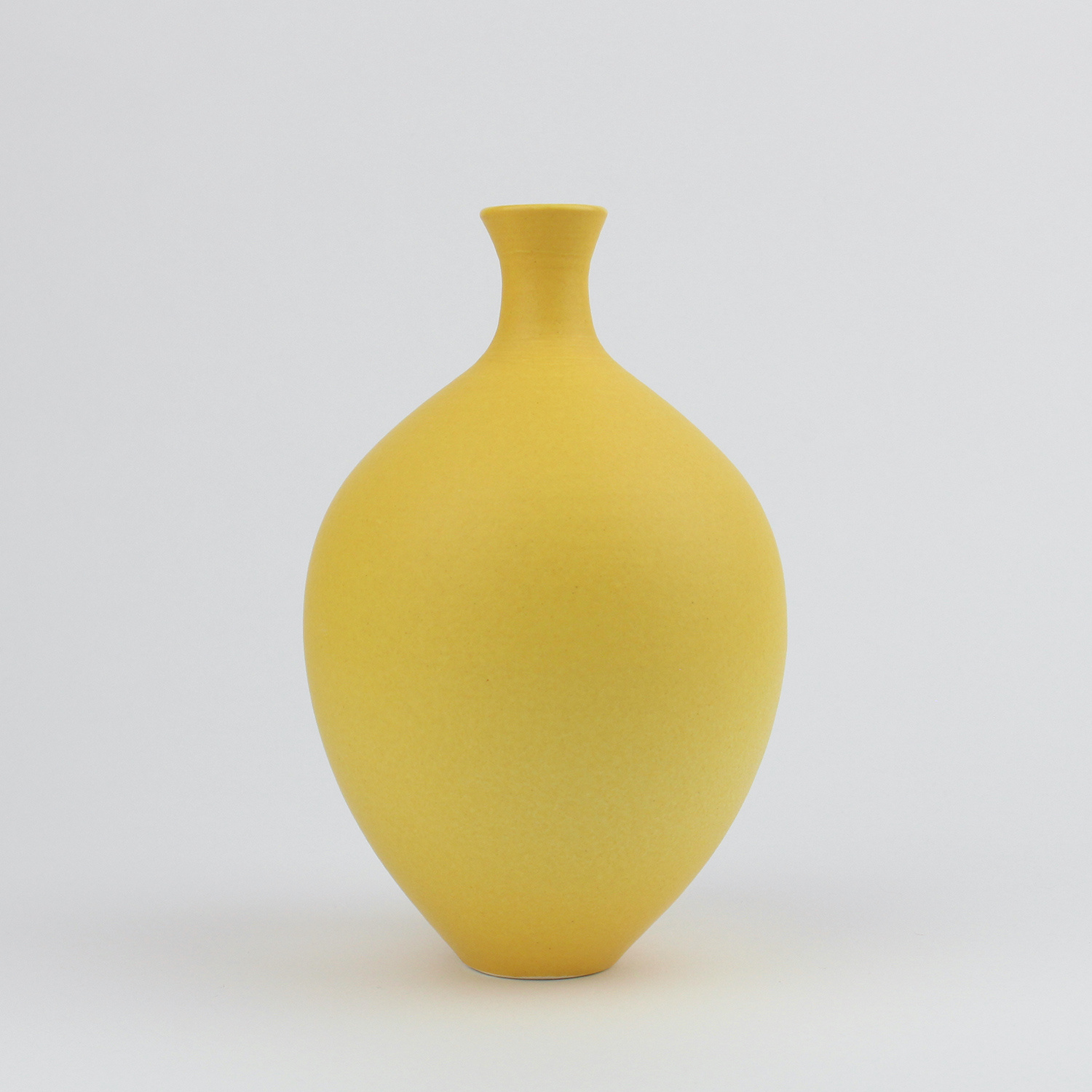 Oval Vase, golden yellow by Lucy Burley