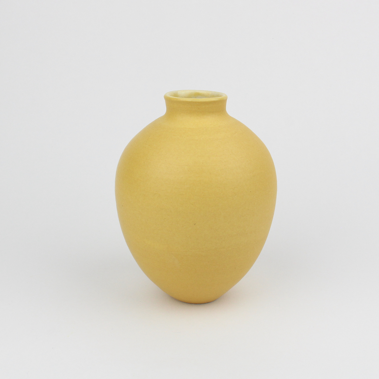 Oval Vase, mustard yellow by Lucy Burley