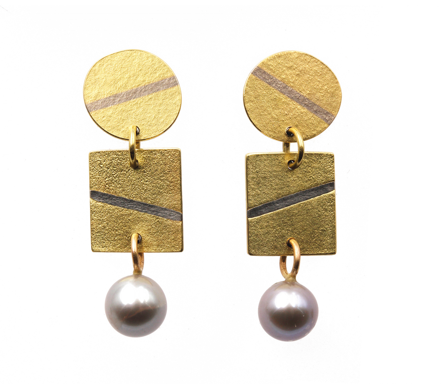 Earrings by Catherine Mannheim